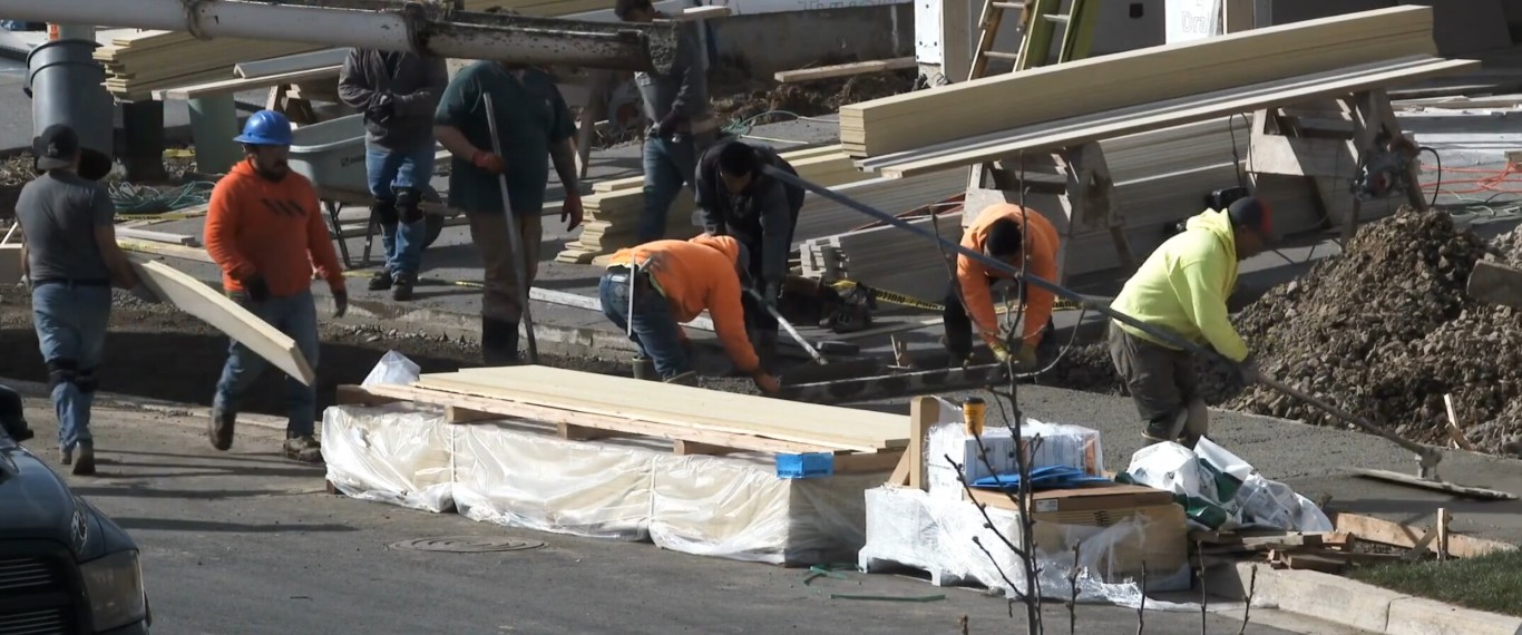 Professional concrete crew working on precision grading and installation in Decatur, IL